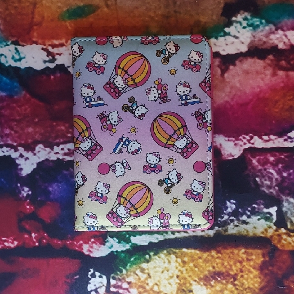 Hello Kitty Passport Holder In Pink, Purple and Yellow